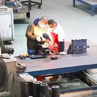  Professional hardware technicians at quality inspection 