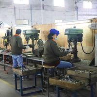 Hardware manufacturing team at drilling station